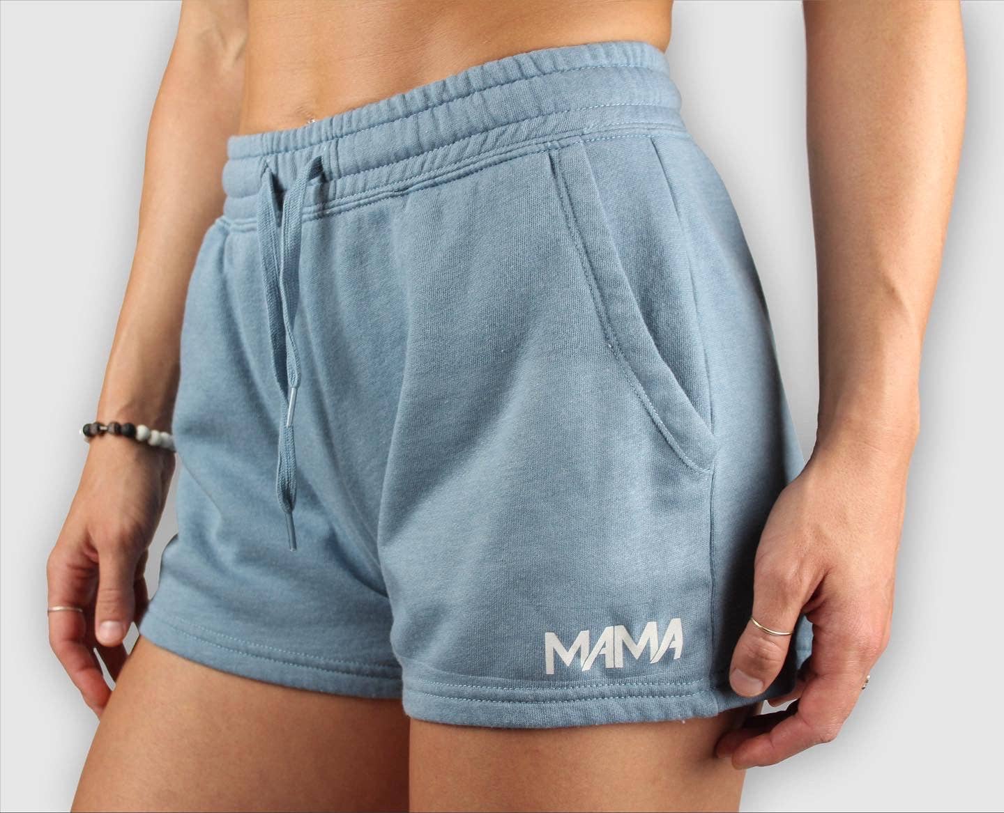 Light blue shorts with 'MAMA' text on a plain background