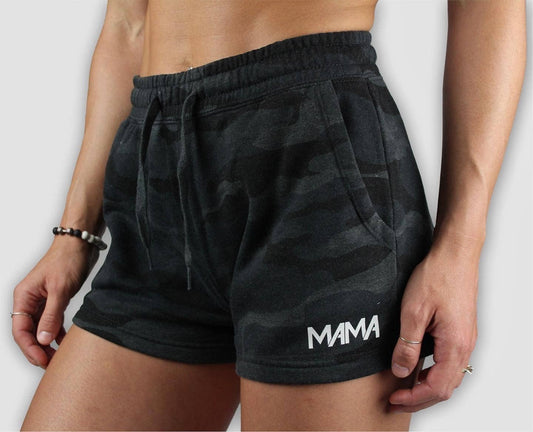 Black camouflage shorts with 'MAMA' text on a white background