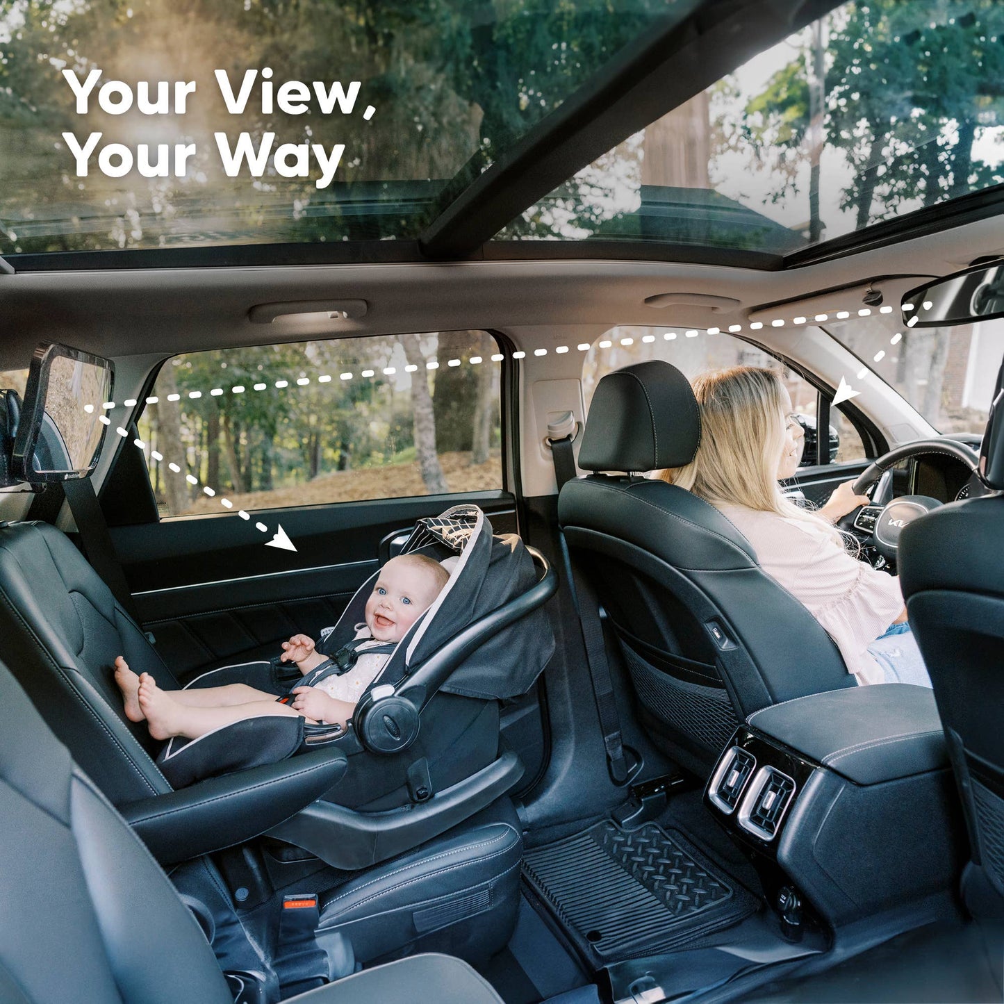 Car interior with a child in a car seat and a woman driving, with 'Your View, Your Way' text.