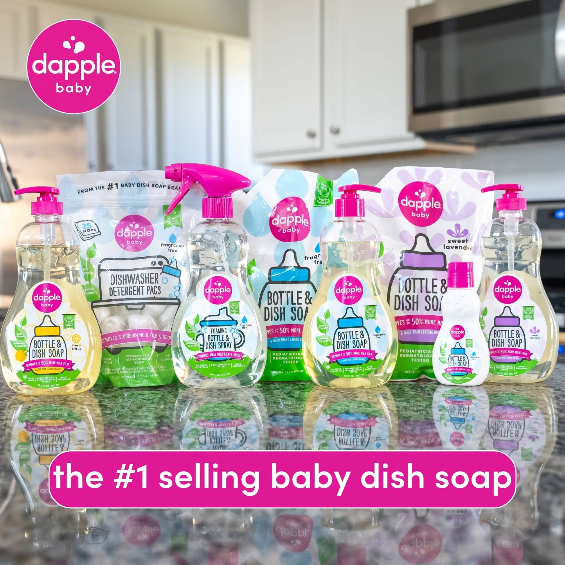 Diverse Dapple Baby product lineup on a kitchen counter with branding and text.