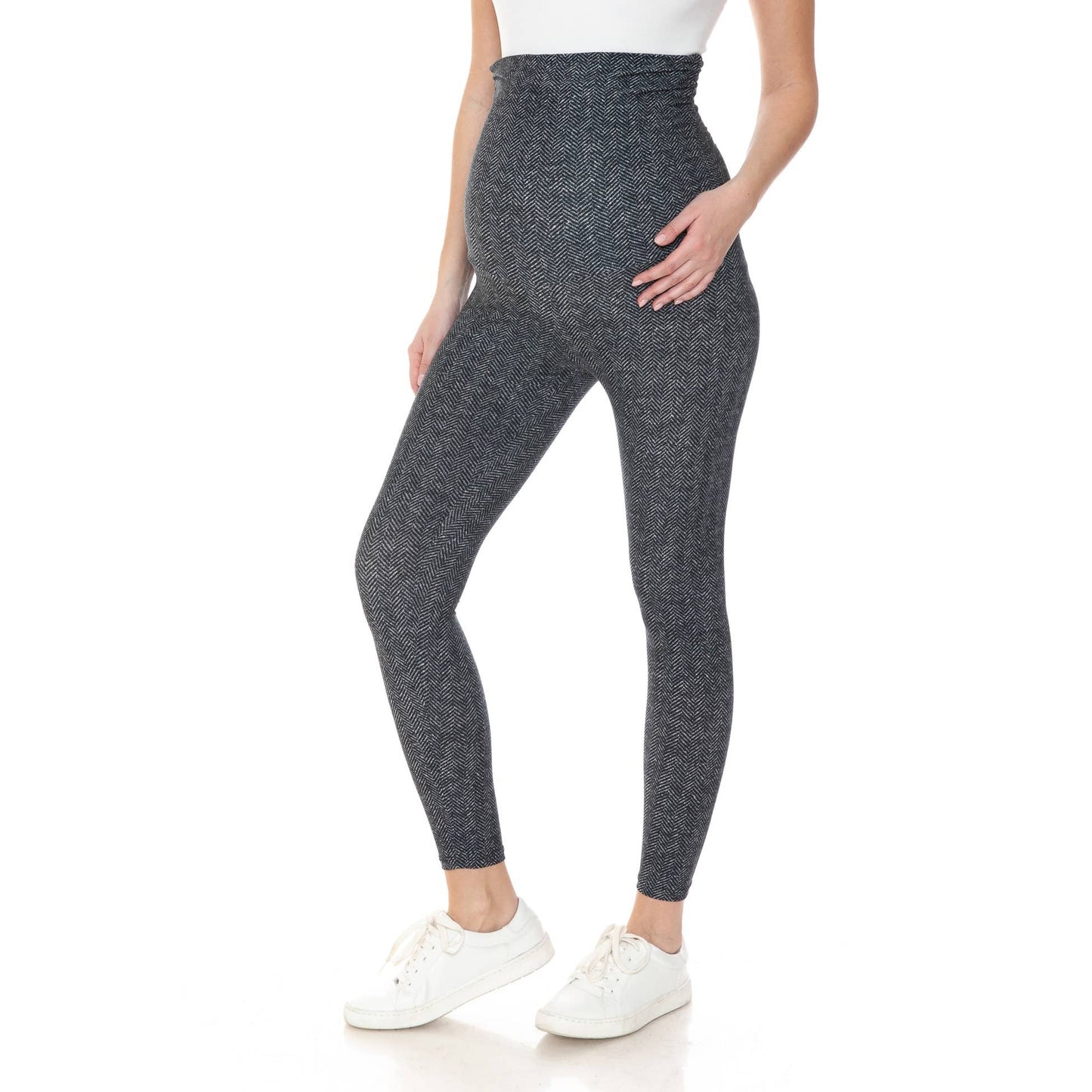A pregnant woman wearing Buttery Soft Full Length Print Maternity Leggings in herringbone pattern.