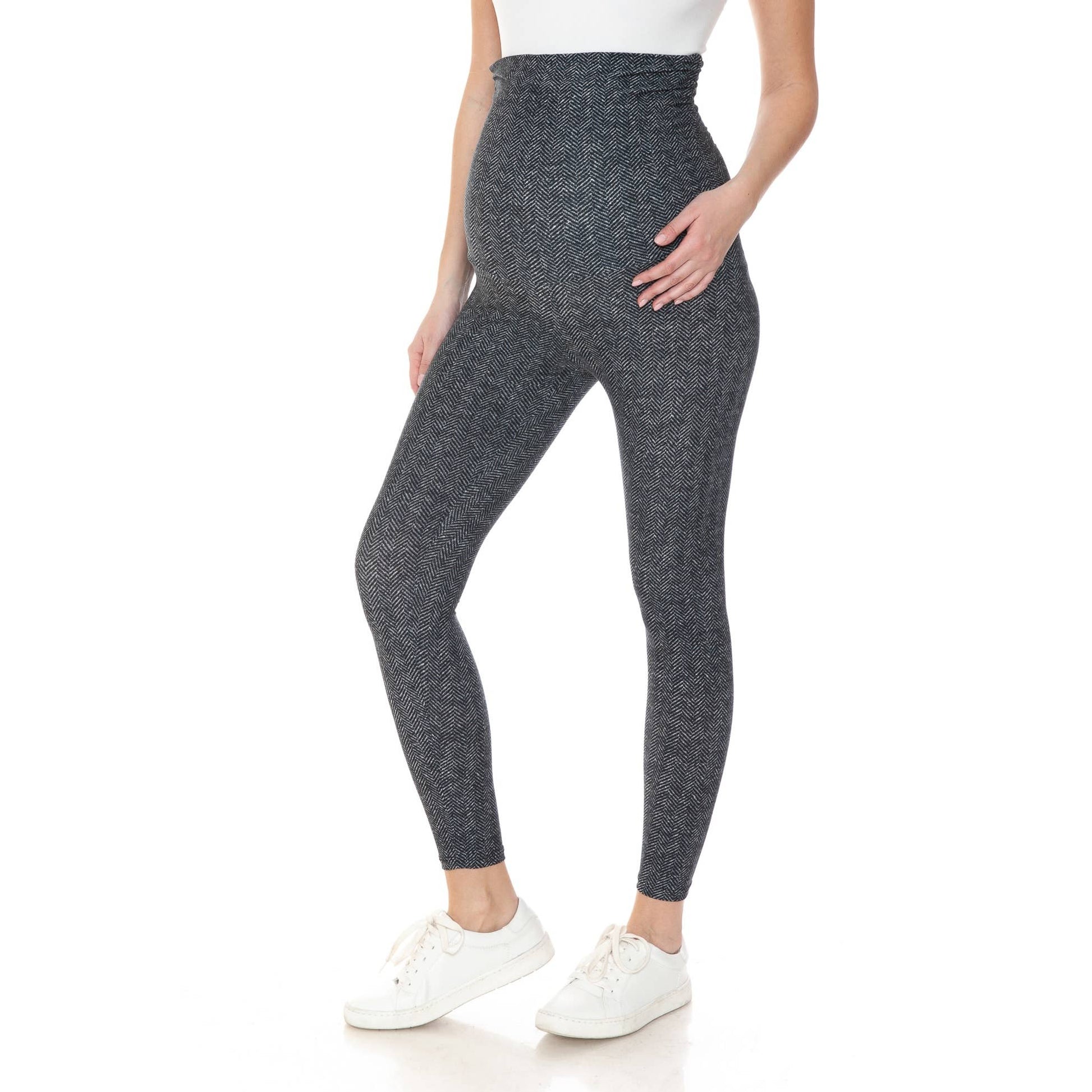 A pregnant woman wearing Buttery Soft Full Length Print Maternity Leggings in herringbone pattern.