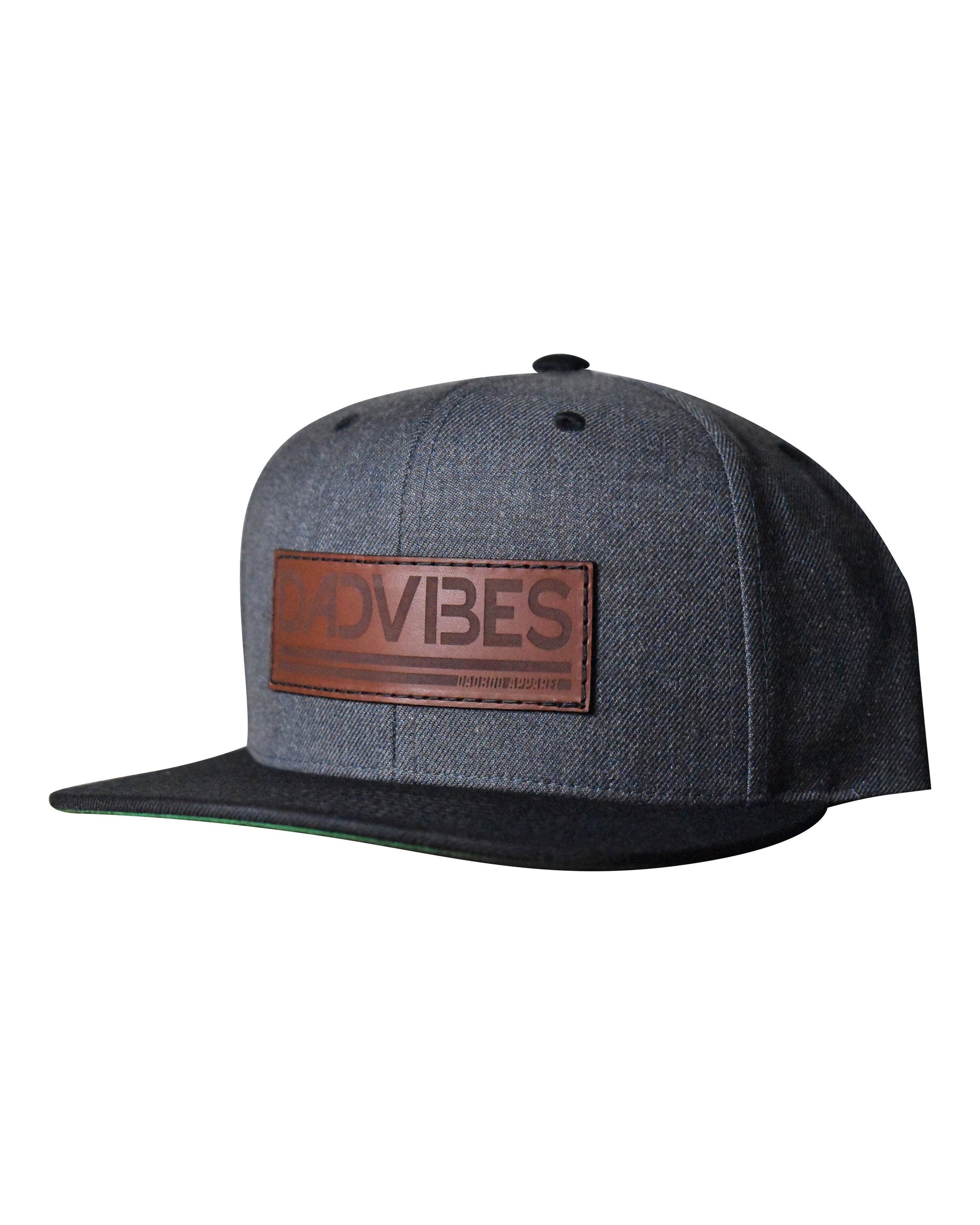 Gray cap with a brown leather patch displaying DADVIBES' on a white background