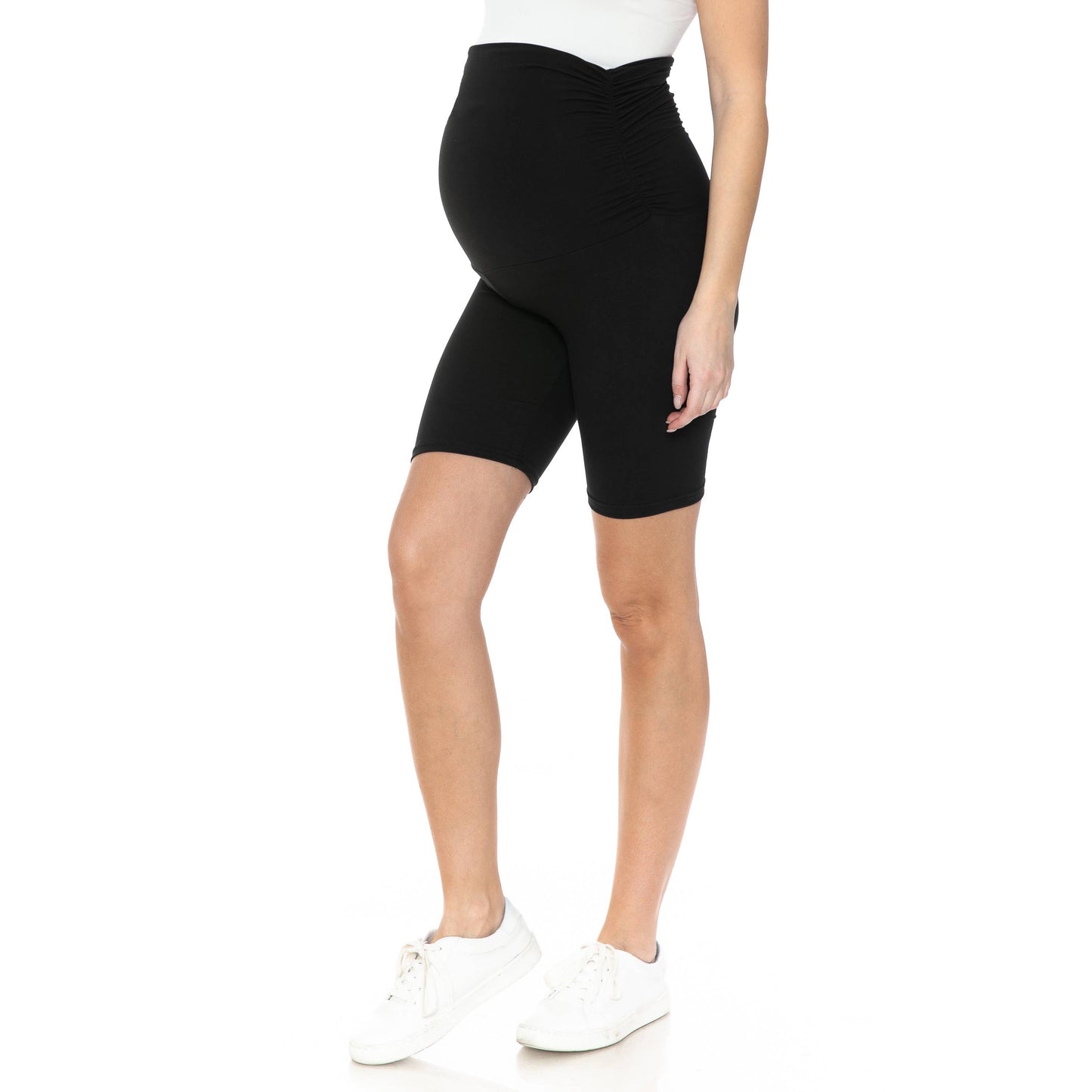 A pregnant woman in comfy Buttery Soft Print Maternity Shorts.