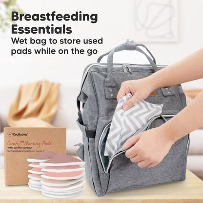 A diaper bag with a wet bag inside for used nursing pads