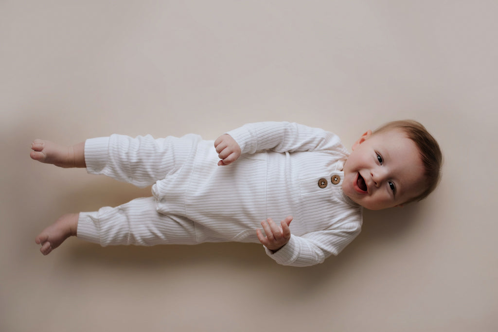 Three Little Tots White Baby Ribbed Playsuit with Pockets