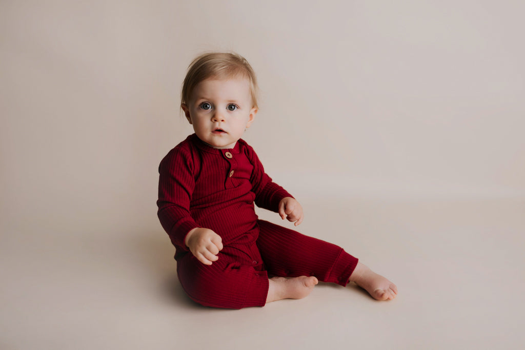 Three Little Tots Ruby Red Baby Ribbed Playsuit with Pockets