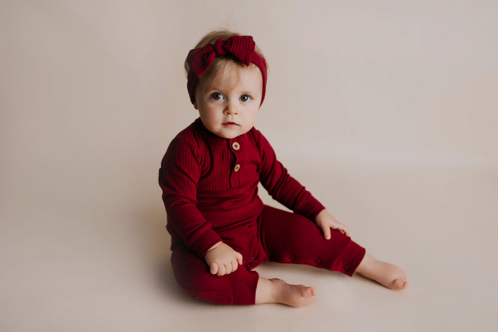 Three Little Tots Ruby Red Baby Ribbed Playsuit with Pockets