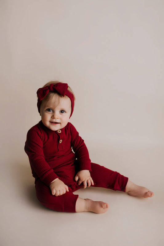 Three Little Tots Ruby Red Baby Ribbed Playsuit with Pockets