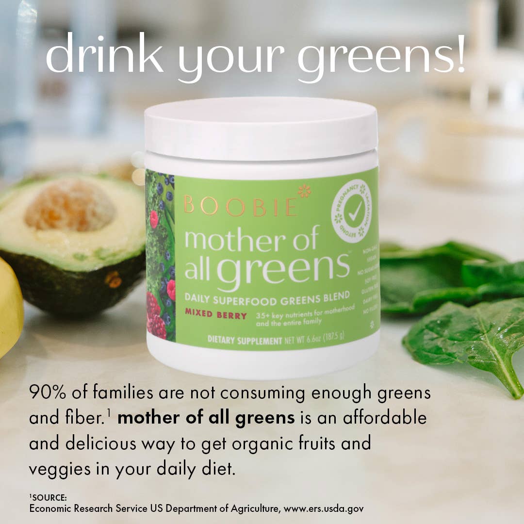 A tub of Boobie Superfoods Mother of All Greens powder in the Mixed Berry flavor with information from a study about the intake of fiber and greens by the USDA.