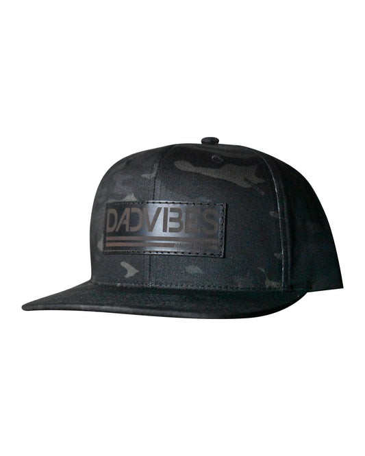 Black camouflage cap with 'DADVIBES' patch on a white background