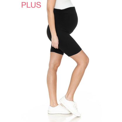 A side view of a pregnant woman in Plus Size Buttery Soft Print Maternity Shorts in Black.